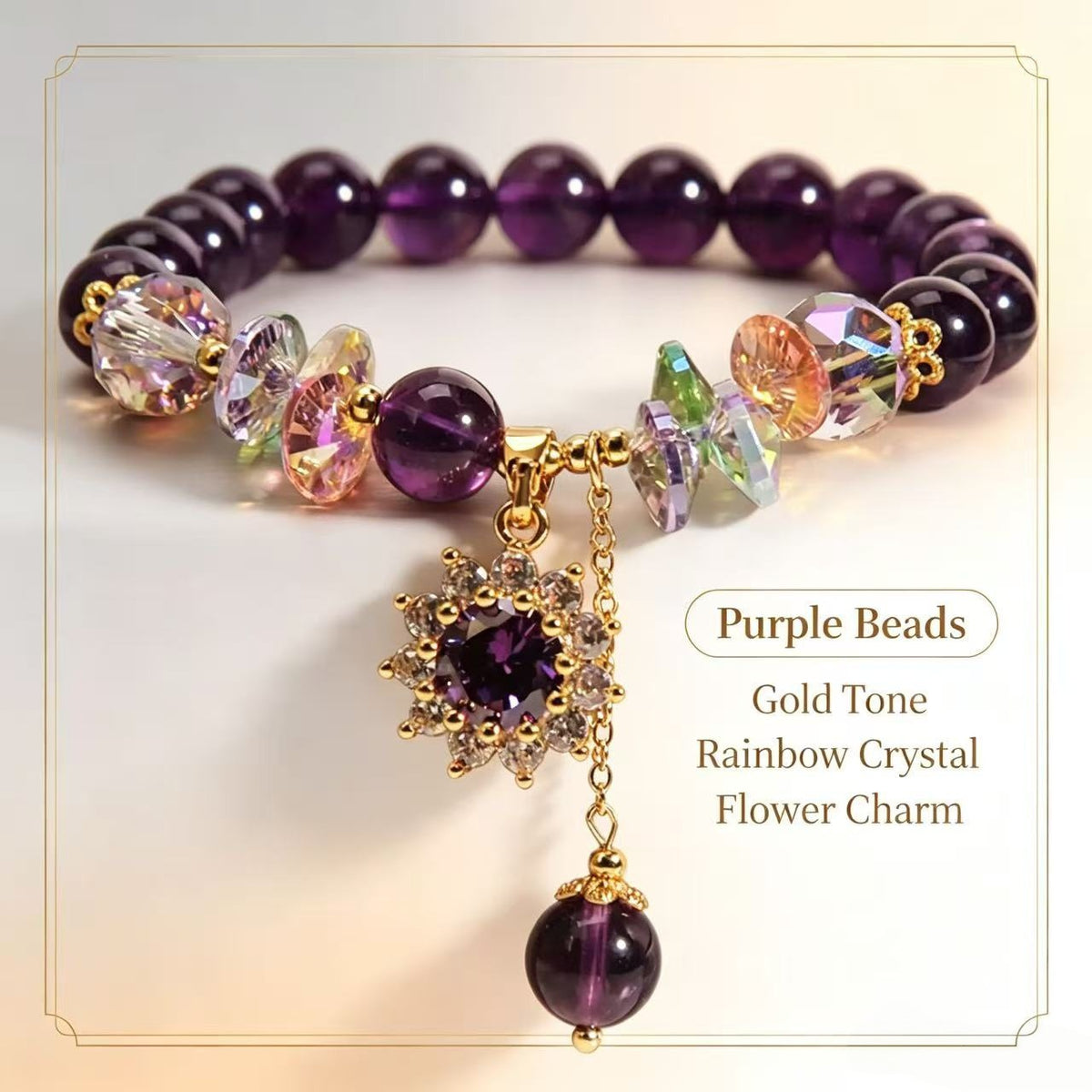Amethyst bracelet detail showing purple beads, gold-tone accents, rainbow crystals and a flower charm.